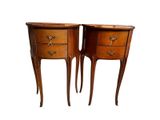 pair of wooden nightstand tables with drawers on each side of each other