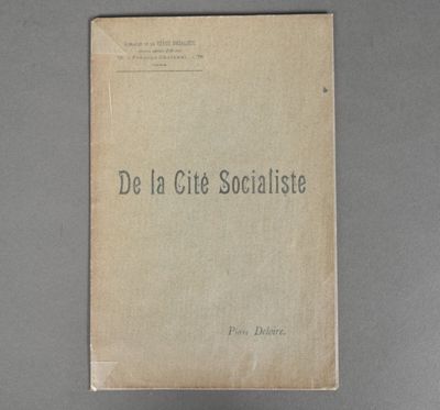 a close up of a book on a table with a black and white image