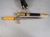 two knives that are laying on a table