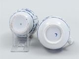 pair of blue and white porcelain vases on clear acrylic stand
