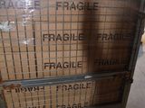 a cart that has some boxes on it in a warehouse