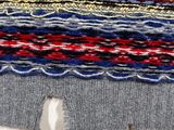an image of a close up of a piece of fabric with a hole in the middle of it