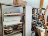 a shelf that has many boxes on top of it