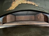 a large oven with a metal grill inside of it