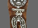 a picture of a clay figurine of a person on a gray background