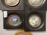 four framed pictures of a woman and a child in a gold frame