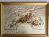 painting of a fan with flowers and leaves on it in a gold frame