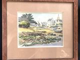 framed watercolor painting of a village scene with a church in the background