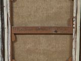 an old picture frame with a picture of a cat in it