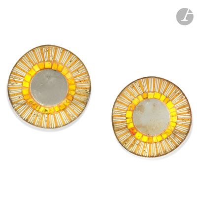 pair of yellow sunbursts on a white background with a white background