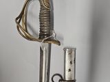 une épée en argent et en or, avec une poignée en argent