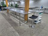 a long table with a chair in the middle of the room