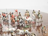 a lot of figurines that are on a table
