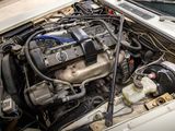 a small engine in the engine bay of a car