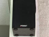 a black suitcase sitting on top of a white table