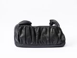 a black leather clutch bag on a white background