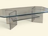 a glass table with a glass top on a white background