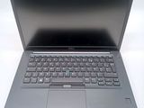 a laptop computer with a keyboard on the top of it