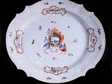a white plate with a picture of a bird on it