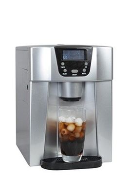 a close up of a coffee machine with a cup of coffee