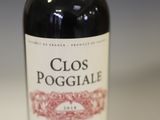 a bottle of wine that is sitting on a table