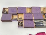 a lot of small boxes that have different types of rocks in them