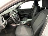 the interior of a car with a steering wheel and a dashboard
