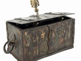 an old wooden box with a metal handle on a white background