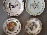 many plates that are sitting on a table