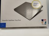 the box is open on the table with the packaging on it