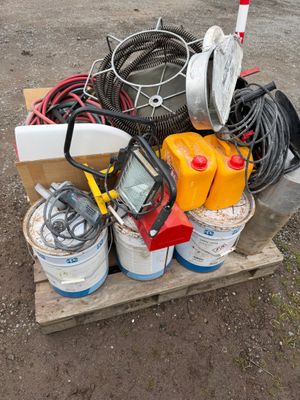 a pile of assorted electrical equipment on a pallet