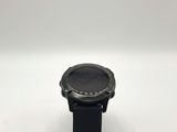 a close up of a smart watch on a white surface