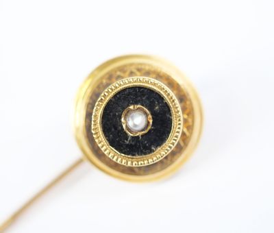 an image of a close up of a button on a white surface
