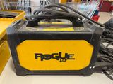 the yellow and black machine is sitting on the table in the store
