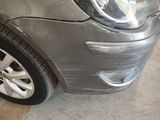 a close up of a car with a denting on it
