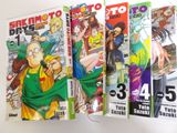 a lot of comic books that are on the table