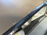 a close up of a car ' s front bumper with a light on