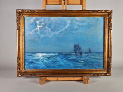une peinture à l'huile représentant un voilier en mer, posée sur un chevalet