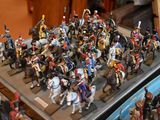 a lot of figurines that are sitting on a tray