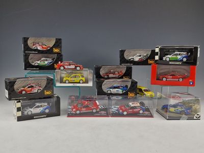 a lot of toy cars that are in a display case