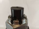 an image of a close up of a metal object on a table