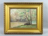 une image représentant un tableau représentant une rivière et des arbres, dans un cadre doré