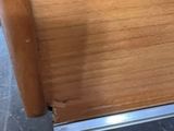 a close up of a piece of wood on the floor
