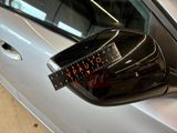 an image of a side view mirror of a car