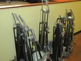a lot of guns that are sitting on the floor
