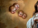 an image of a painting of a woman holding a baby in her arms