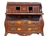 a small wooden desk with drawers on top of it