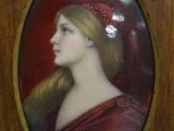 painting of a woman in a red dress in a wooden frame