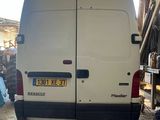 a white van that is parked in a garage