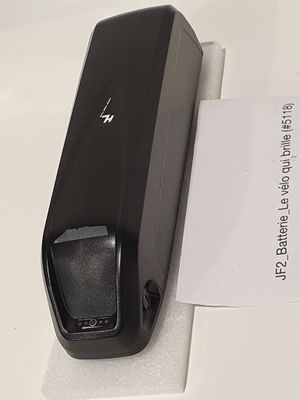 an image of a cell phone sitting on top of a desk